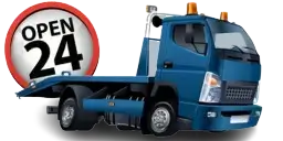 Sign displaying the towing service hours in Marseille